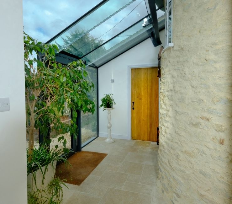 internal view of structural glass roof with glass beam supports