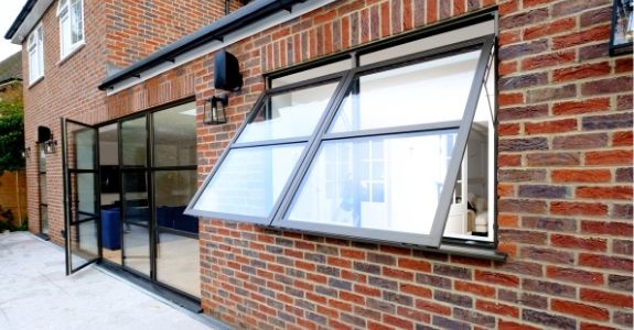 top hung aluminium casement windows with glazing bars for an industrial style design top hung aluminium casement windows with glazing bars for an industrial style design