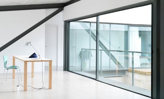 oversized sliding glass door with ultra slim sightlines and minimal aluminium framing