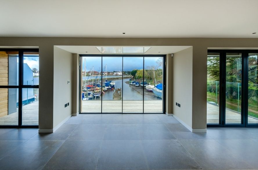 sieger aluminium bifold door and sieger slim framed sliding door with stunning waterfront views sieger aluminium bifold door and sieger slim framed sliding door with stunning waterfront views