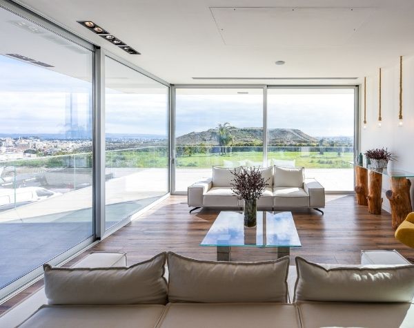 open corner sieger slim sliding glass doors in a luxury Greek villa open corner sieger slim sliding glass doors in a luxury Greek villa