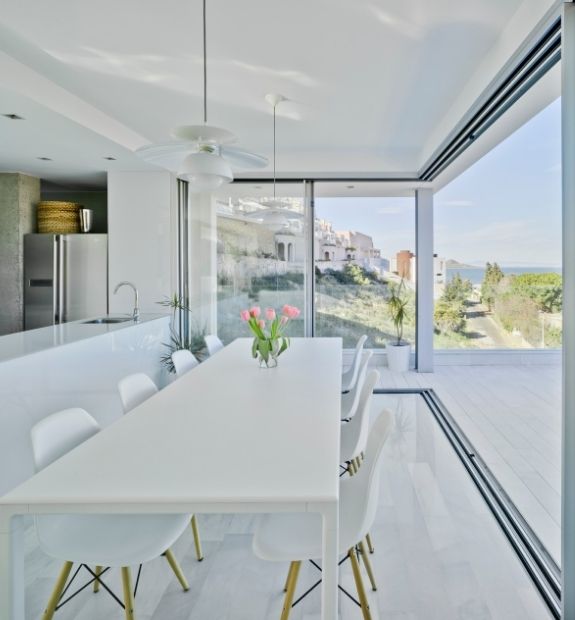 open corner slim sliding door on a cliffside holiday villa in Greece open corner slim sliding door on a cliffside holiday villa in Greece
