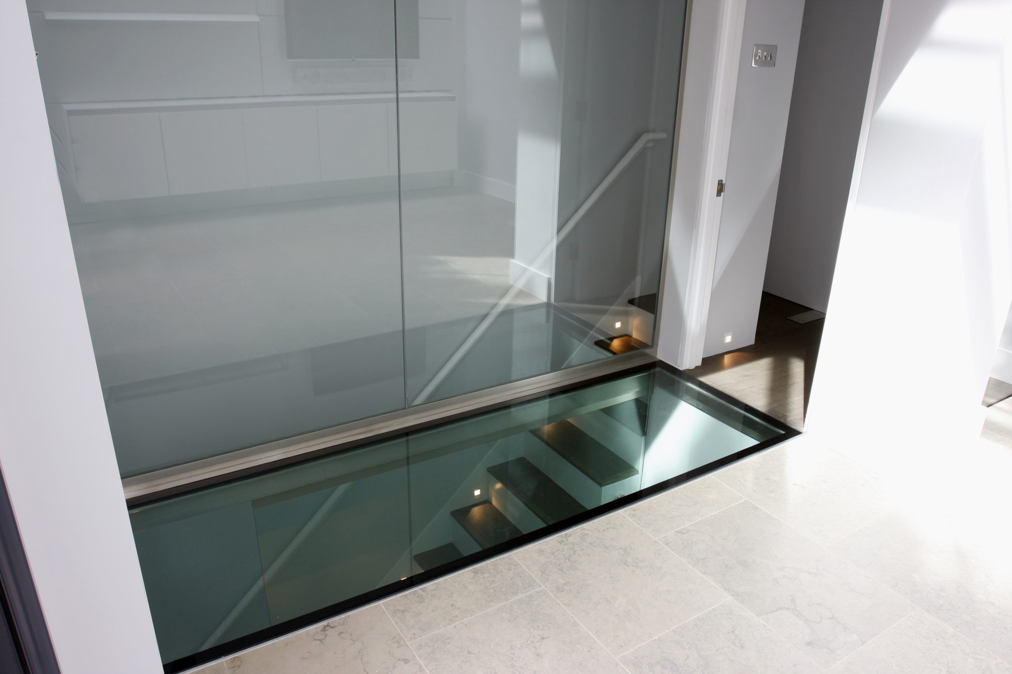 Top U.S. Cities with the Most Dramatic Penthouse Condos - High Rise Glass Floors Offer Level Penthouse Remote