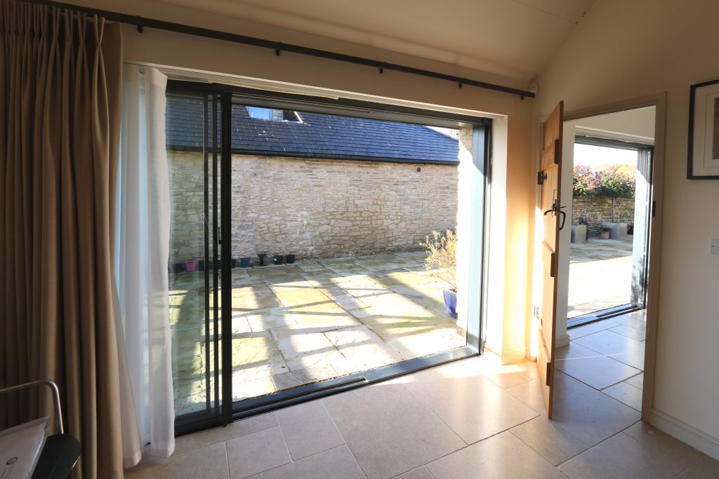 View through sliding glass terrace doors - Stable Barn - Sieger Systems